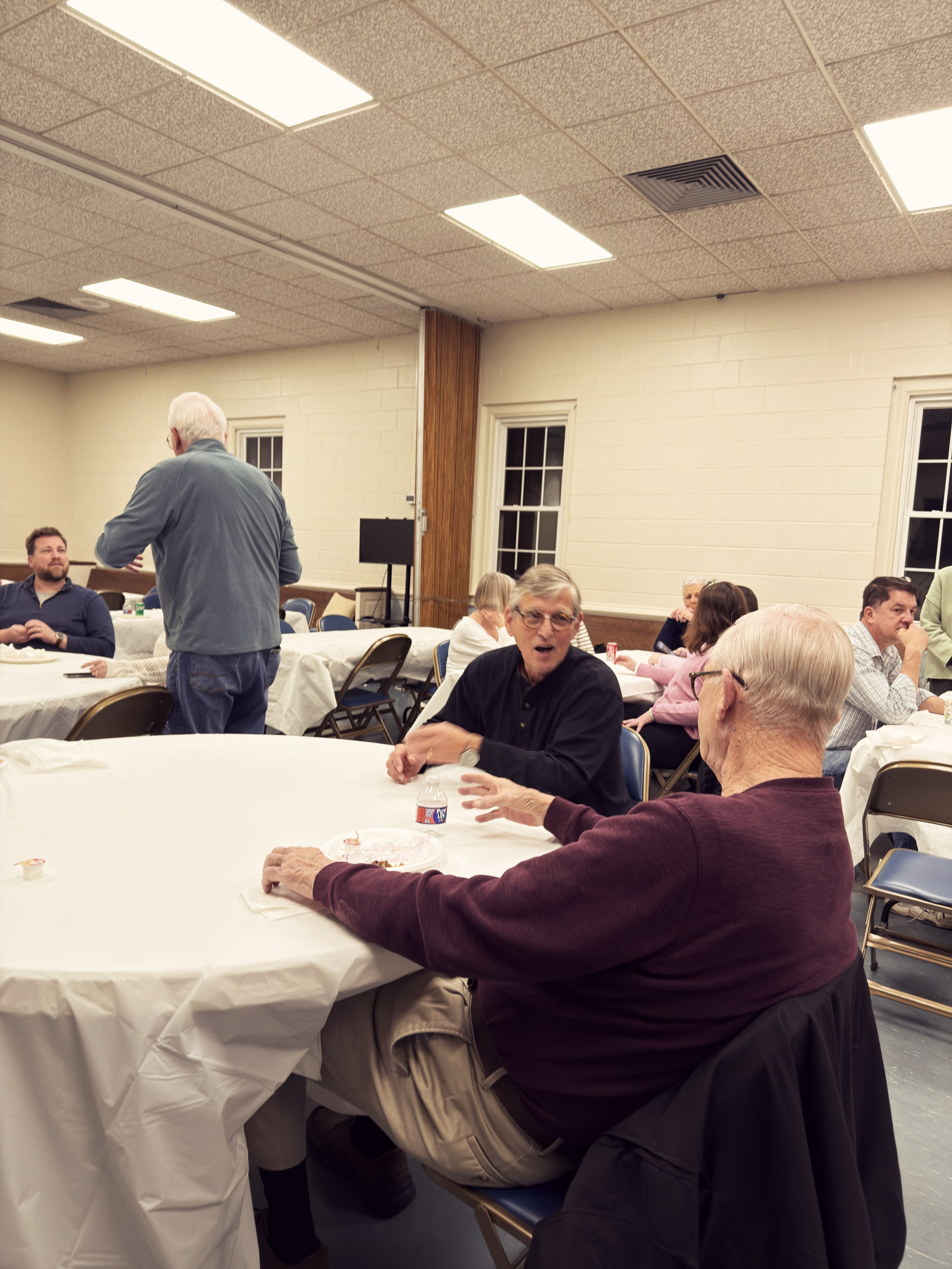 Welborne community members gathered in fellowship and conversation